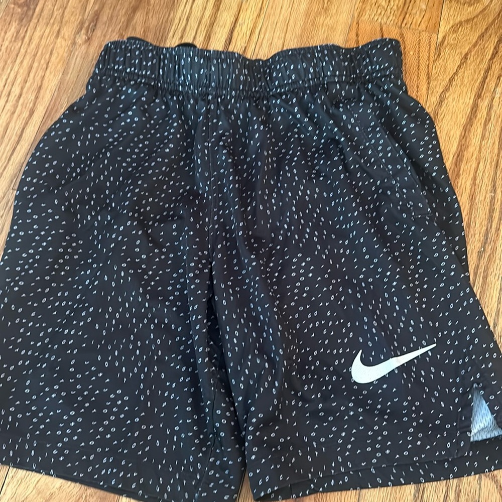 Nike Shorts with Letter Pattern and White Logo. - Size Small